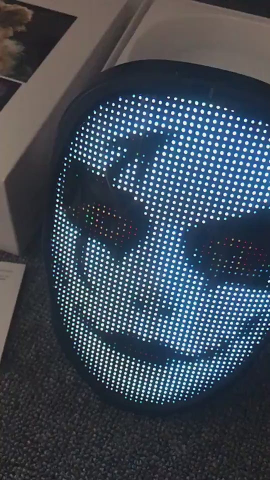 Halloween LED face mask glowing in the dark with multiple colors